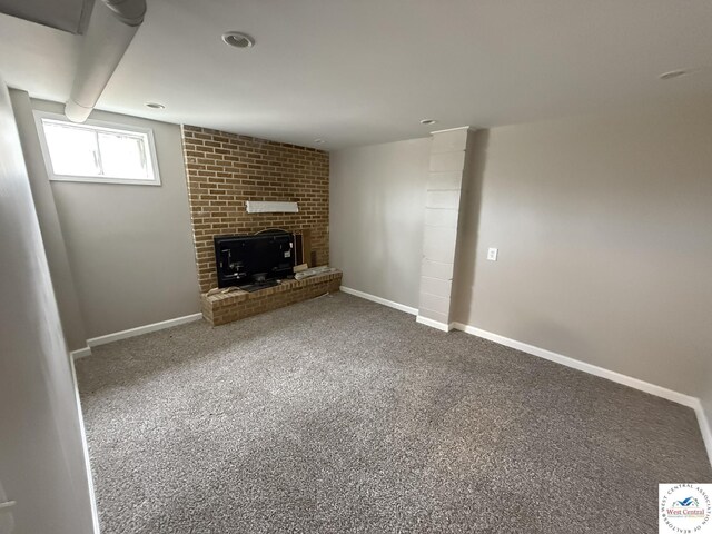 31450 Stonecrest Rd, Warsaw, MO 65355 - unfurnished living room featuring carpet flooring, baseboards, and a fireplace