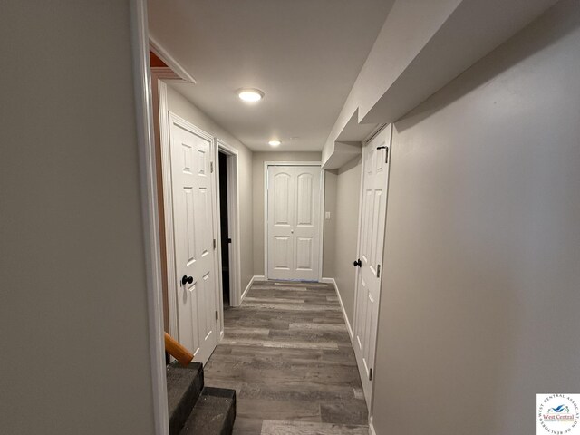 31450 Stonecrest Rd, Warsaw, MO 65355 - hallway featuring dark wood finished floors and baseboards