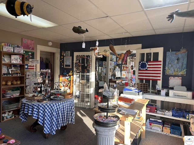 403 Van Buren St, Warsaw, MO 65355 - miscellaneous room with a drop ceiling and carpet flooring