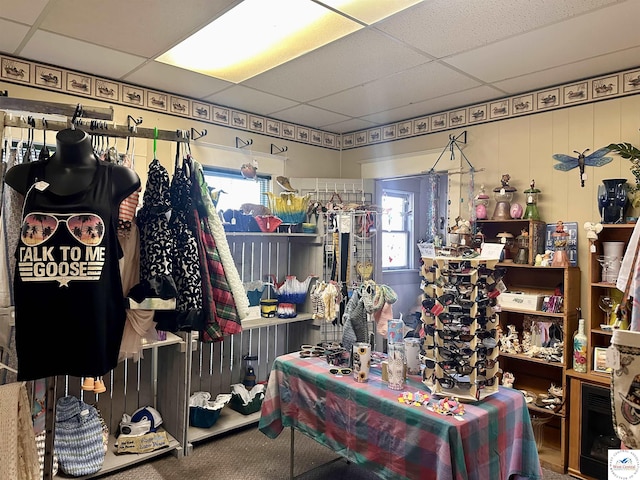 403 Van Buren St, Warsaw, MO 65355 - misc room with a paneled ceiling and carpet