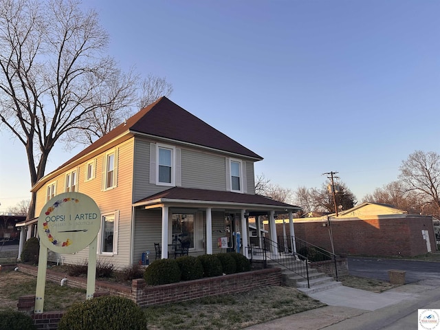 403 Van Buren St, Warsaw, MO 65355 - view of front of property featuring covered porch