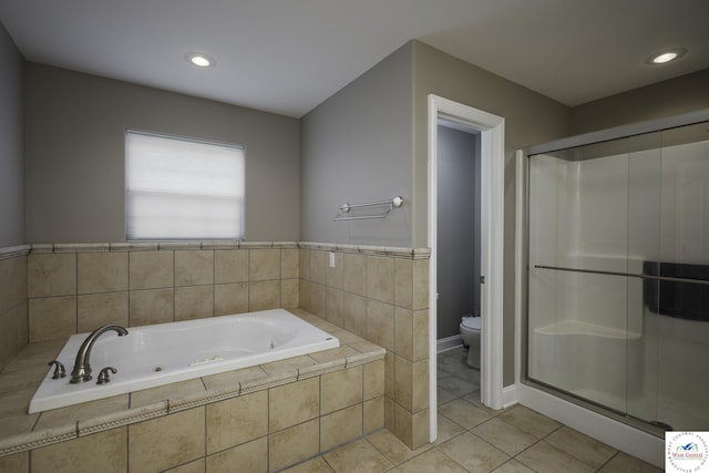 3415 Callaway Dr, Sedalia, MO 65301 - full bathroom with toilet, a jetted tub, a shower stall, tile patterned floors, and recessed lighting