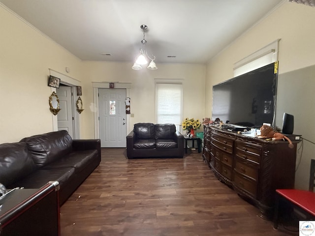 living room featuring dark wood-style flooring and visible vents