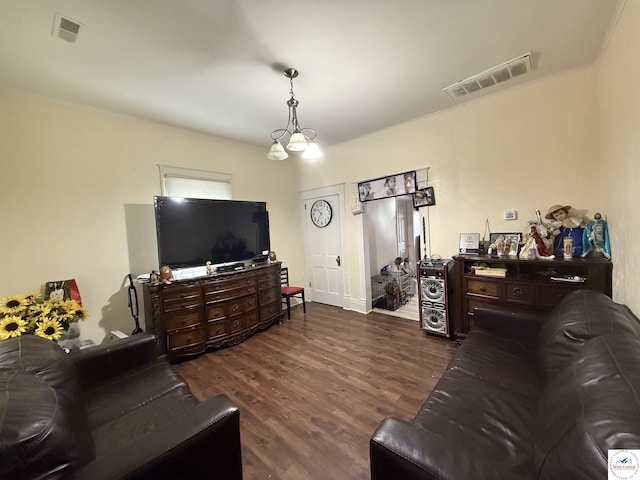 living room with visible vents and dark wood-type flooring