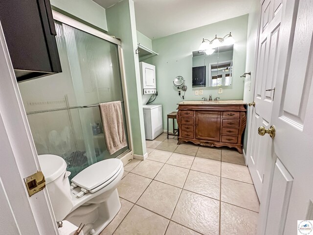 15157 Bass Rd, Gravois Mills, MO 65037 - bathroom with estacked washer and dryer, toilet, vanity, and a shower stall