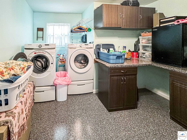 15157 Bass Rd, Gravois Mills, MO 65037 - laundry room featuring separate washer and dryer and cabinet space