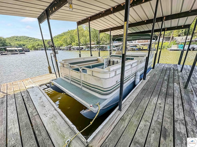 15157 Bass Rd, Gravois Mills, MO 65037 - dock area with a water view and boat lift