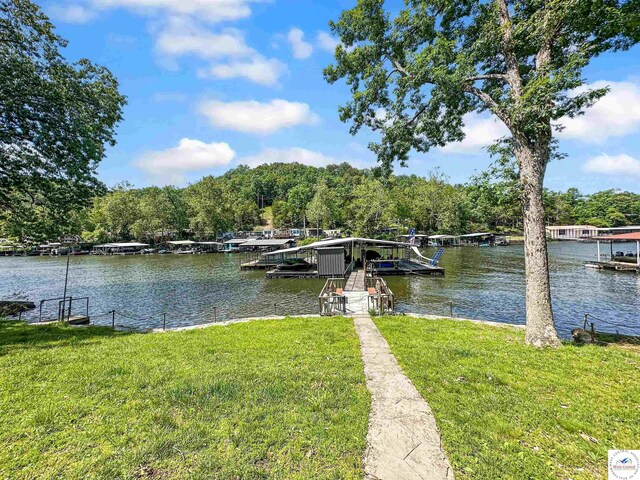 15157 Bass Rd, Gravois Mills, MO 65037 - dock area featuring a yard and a water view