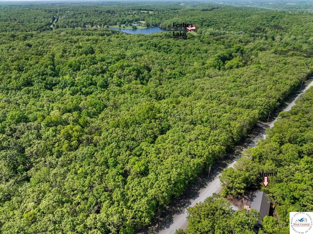 Gardiner Rd, Edwards, MO 65326 - drone / aerial view of a heavily wooded area and a large body of water