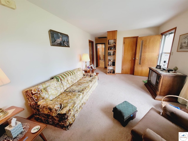 330 W State St, Tipton, MO 65081 - living area featuring light colored carpet