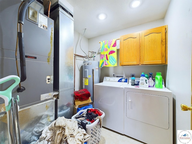 113 SE 1171st Rd, Knob Noster, MO 65336 - washroom with washing machine and dryer, cabinet space, water heater, recessed lighting, and heating unit