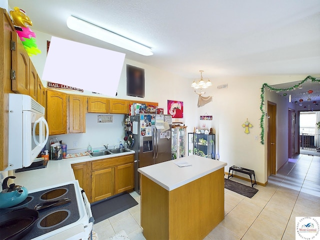 113 SE 1171st Rd, Knob Noster, MO 65336 - kitchen with white appliances, a chandelier, light tile patterned flooring, light countertops, and a sink