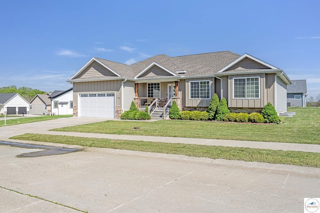 ranch-style house featuring a garage, board and batten siding, a front yard, concrete driveway, and covered porch