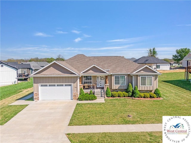 19665 Mockingbird Ln, Sedalia, MO 65301 - single story home featuring board and batten siding, stone siding, driveway, a garage, and a front yard