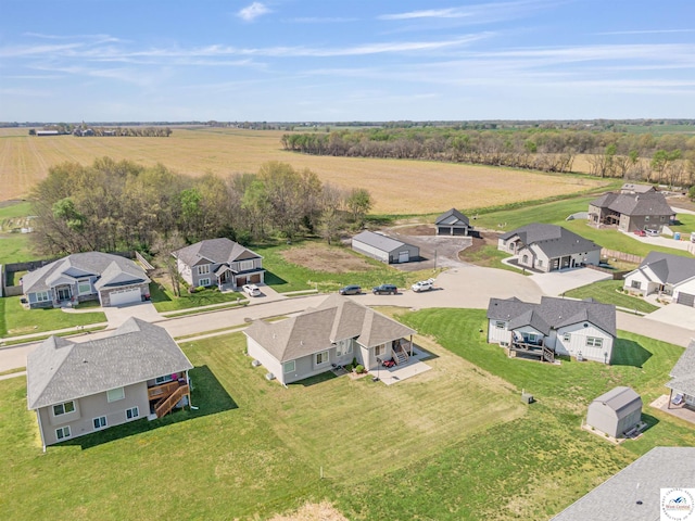birds eye view of property featuring a residential view and a rural view