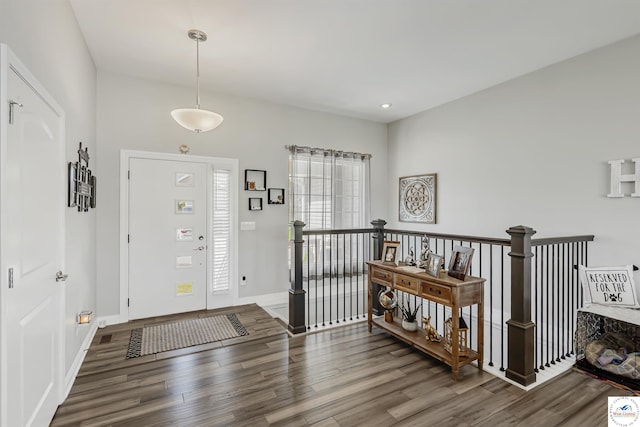 entrance foyer with baseboards, recessed lighting, and wood finished floors