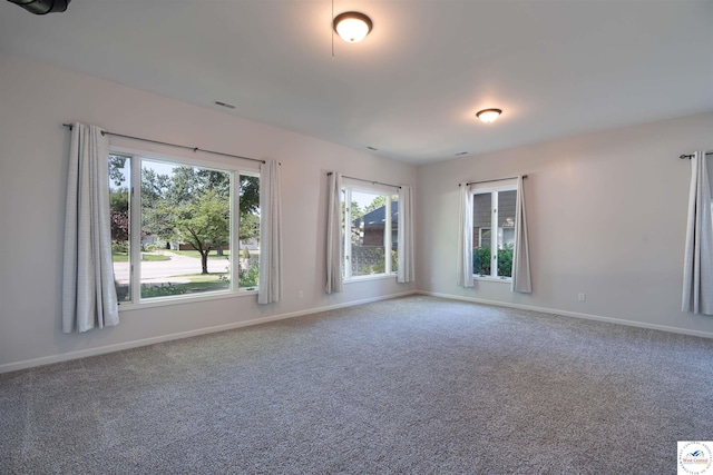 1114 W Broadway Blvd, Sedalia, MO 65301 - carpeted spare room with baseboards