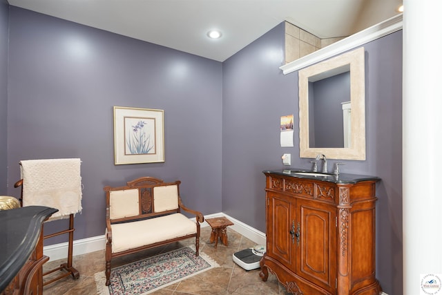 1114 W Broadway Blvd, Sedalia, MO 65301 - bathroom with vanity and baseboards
