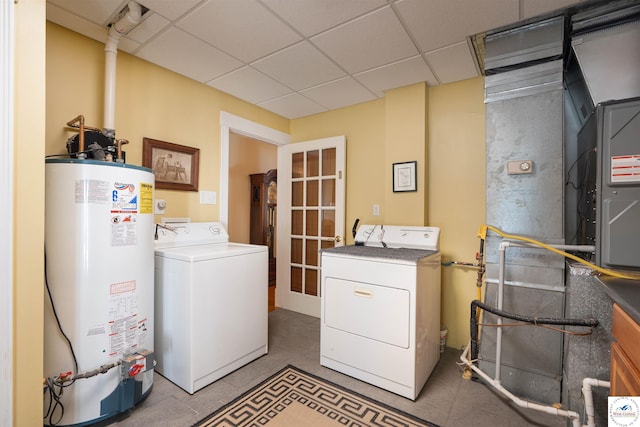 1114 W Broadway Blvd, Sedalia, MO 65301 - laundry room featuring water heater and washing machine and clothes dryer