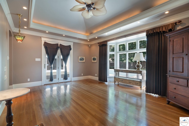 1114 W Broadway Blvd, Sedalia, MO 65301 - empty room featuring ornamental molding, a ceiling fan, a raised ceiling, wood finished floors, and recessed lighting
