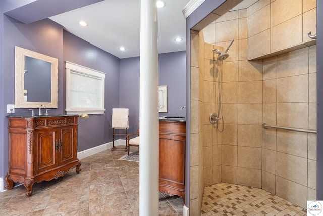 1114 W Broadway Blvd, Sedalia, MO 65301 - full bathroom with ornate columns, tiled shower, vanity, and recessed lighting