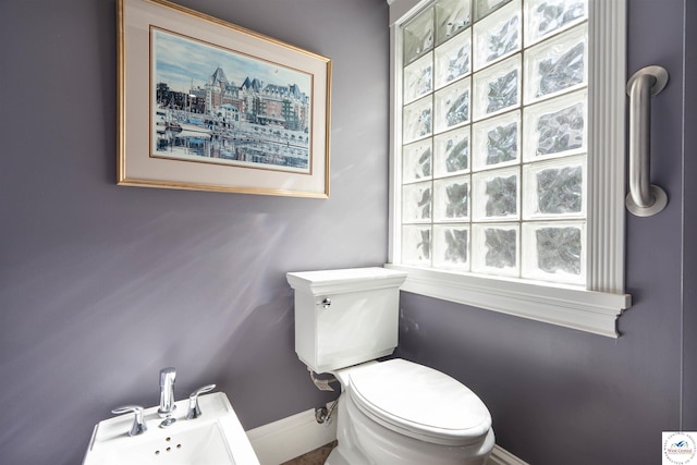 1114 W Broadway Blvd, Sedalia, MO 65301 - half bathroom featuring baseboards and a bidet