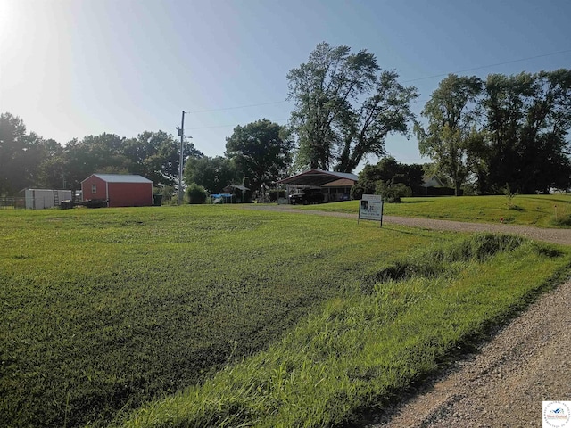 30512 S Hess Rd, Harrisonville, MO 64701 - view of yard featuring a carport