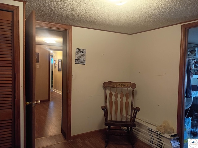 30512 S Hess Rd, Harrisonville, MO 64701 - living area featuring wood finished floors and a textured ceiling