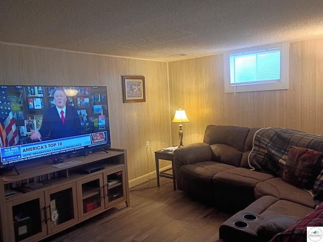 30512 S Hess Rd, Harrisonville, MO 64701 - living room with a textured ceiling, wood finished floors, and wood walls