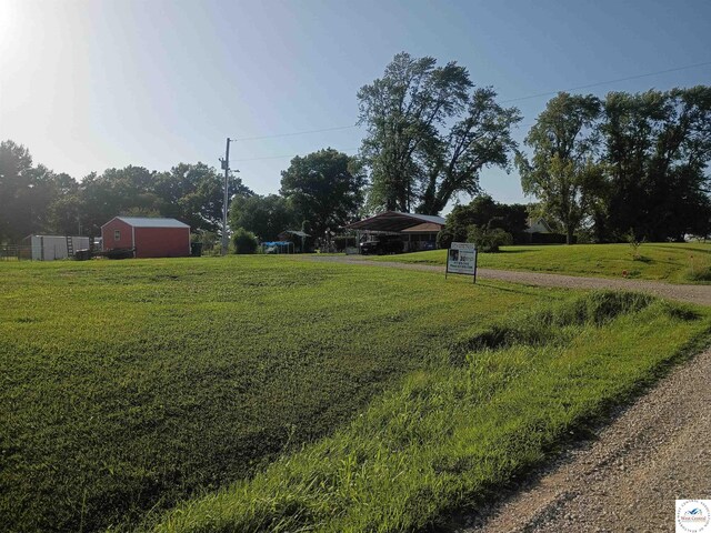 30512 S Hess Rd, Harrisonville, MO 64701 - view of yard featuring a carport