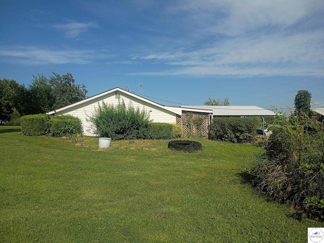 30512 S Hess Rd, Harrisonville, MO 64701 - view of side of home with a lawn