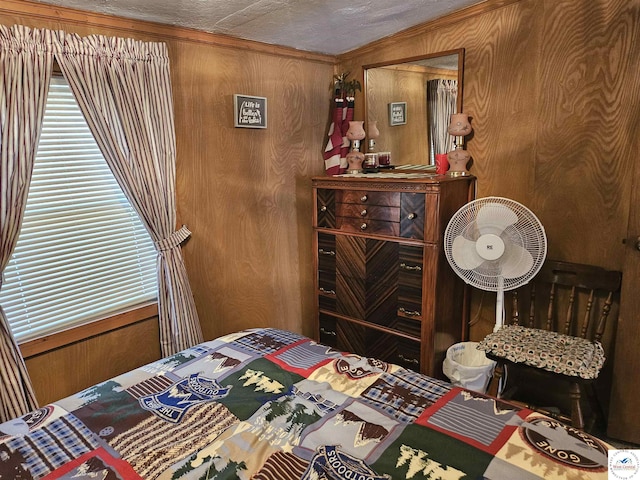 bedroom with wood walls