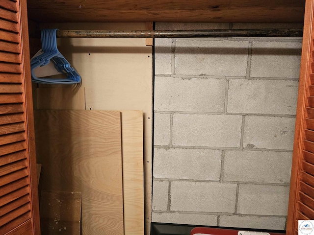 room details featuring concrete block wall
