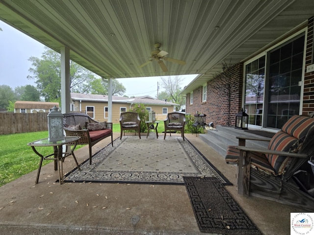 502 S Ferguson Ave, Tipton, MO 65081 - view of patio featuring fence, a ceiling fan, and outdoor lounge area
