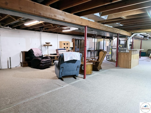 502 S Ferguson Ave, Tipton, MO 65081 - unfinished below grade area with carpet and gas water heater