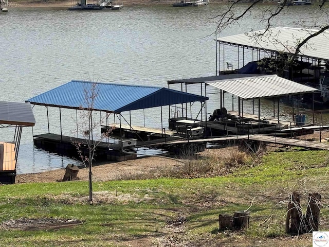 dock featuring a water view and boat lift