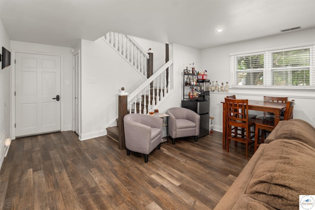 321 E 17th St, Sedalia, MO 65301 - living room featuring wood finished floors, stairway, baseboards, and recessed lighting