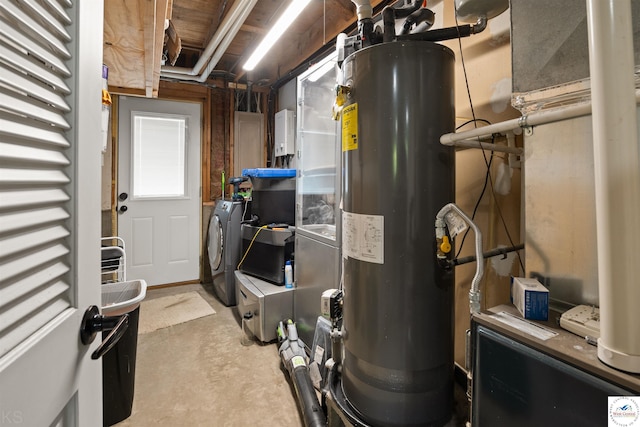 321 E 17th St, Sedalia, MO 65301 - utility room with independent washer and dryer and electric water heater