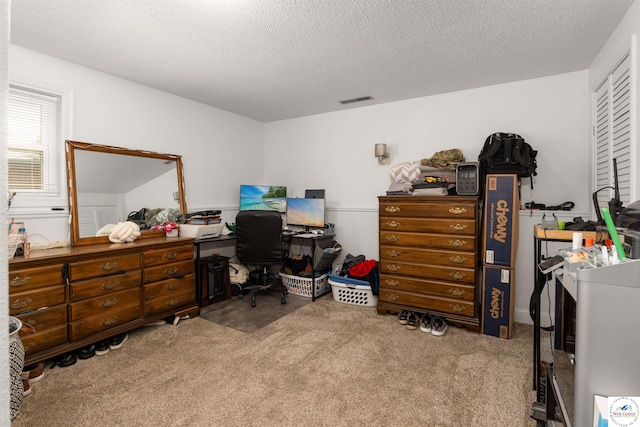 321 E 17th St, Sedalia, MO 65301 - carpeted home office featuring a textured ceiling