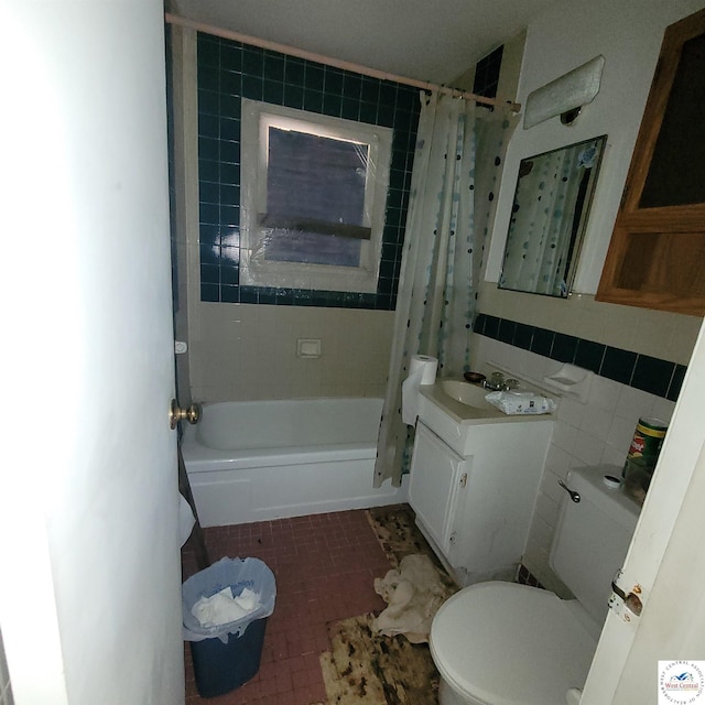 bathroom featuring toilet, tile walls, shower / bath combo, and vanity