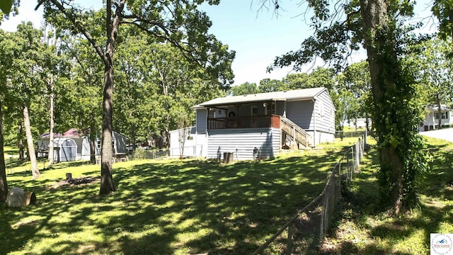 715 Hickory St, Warsaw, MO 65355 - rear view of house featuring stairway