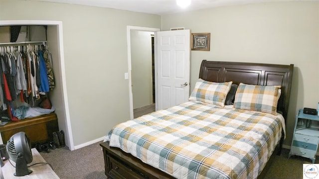 715 Hickory St, Warsaw, MO 65355 - carpeted bedroom featuring a closet and baseboards