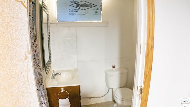 715 Hickory St, Warsaw, MO 65355 - bathroom with vanity and toilet