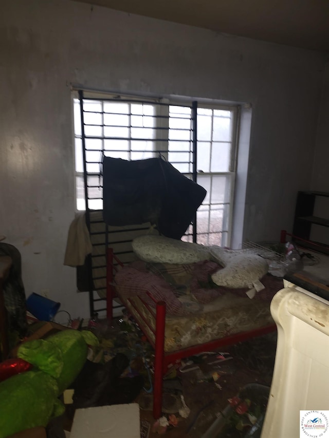 bedroom featuring multiple windows