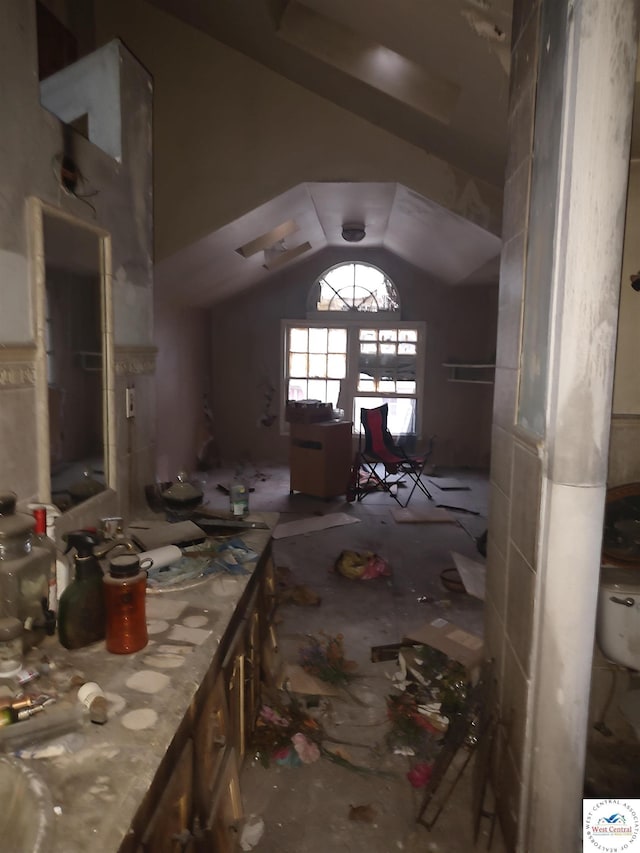 dining room with vaulted ceiling