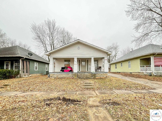 bungalow-style house featuring covered porch