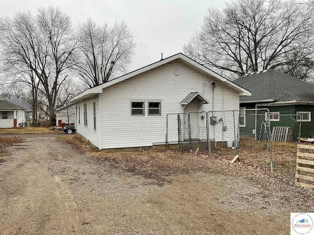 view of front of home with fence