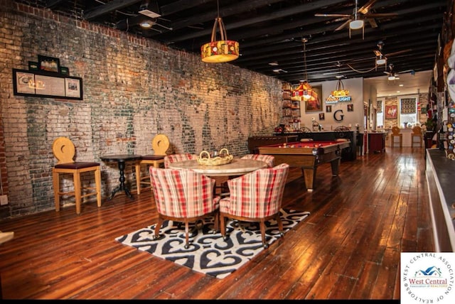 304 W Main St, Sedalia, MO 65301 - playroom featuring a ceiling fan, brick wall, wood-type flooring, and billiards