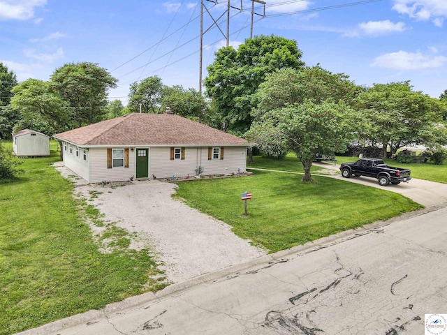 810 Harris St, Clinton, MO 64735 - view of front of house featuring driveway and a front lawn