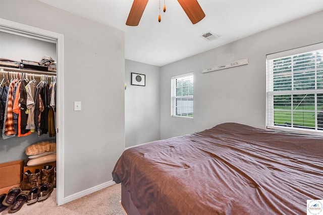 810 Harris St, Clinton, MO 64735 - carpeted bedroom with a closet, baseboards, and ceiling fan